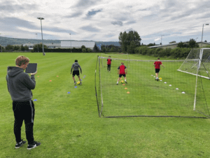 Apprentice coaches are livestreamed from a field during their assessment